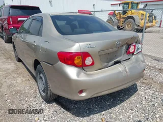 2009 Toyota Corolla with VIN 1NXBU40E69Z002692, listed as a IAAI auction lot 41942713 with 127,609 mi miles. Bid and sale history available at carsss.com. Image 3.