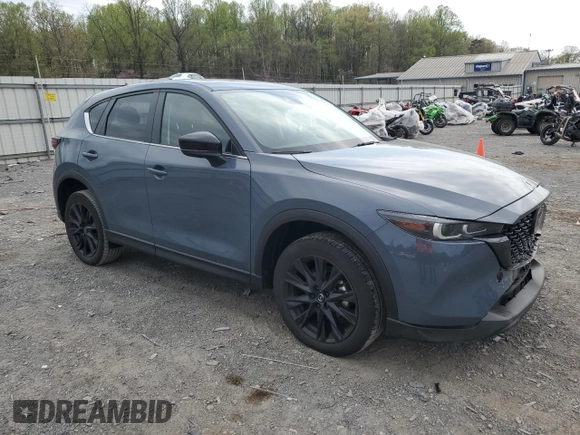 2023 Mazda CX-5 S Carbon Edition z VIN JM3KFBCM9P0158890, wystawiony jako Copart lot #53839045 z przebiegiem 26 623 mil mil oraz Szkody całkowita. Historia ofert i sprzedaży dostępna na DreamBid. Obrazek 4.