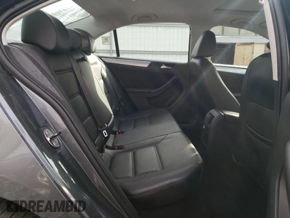 2013 Volkswagen Jetta SE z VIN 3VWDP7AJ4DM361292, wystawiony jako Copart lot #55861875 z przebiegiem 97 771 mil mil oraz Czysty tytuł • Clean title. Historia ofert i sprzedaży dostępna na DreamBid. Obrazek 10.