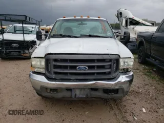 2004 Ford F-350 with VIN 1FDWF36P44EC05243, listed as a Copart auction lot 37153244 with 221,116 mi miles and Salvage title. Bid and sale history available at DreamBid. Image 5.