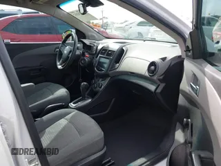 2013 Chevrolet Sonic LS with VIN 1G1JA5SH9D4249356, listed as a IAAI auction lot 42373352 with 151,337 mi miles and . Bid and sale history available at DreamBid. Image 5.