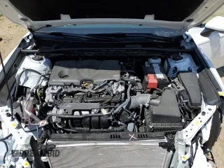 2023 Toyota Camry LE z VIN 4T1R11AK5PU792249, wystawiony jako Copart lot #58578705 z przebiegiem 20 839 mil mil oraz Szkoda całkowita • Salvage title. Historia ofert i sprzedaży dostępna na DreamBid. Obrazek 11.
