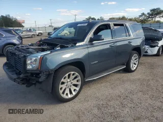 2019 GMC Yukon SLT with VIN 1GKS1BKC0KR387936, listed as a Copart auction lot 77191904 with 60,514 mi miles and Salvage Title. Bid and sale history available at carsss.com. Image 1.