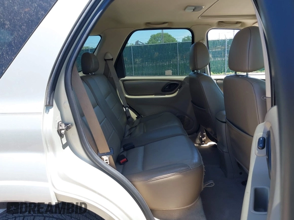 2004 Ford Escape Limited with VIN 1FMCU04174KA97935, listed as a IAAI auction lot 42314791 with 143,900 mi miles and . Bid and sale history available at DreamBid. Image 8.