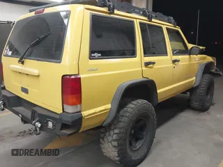 2001 Jeep Cherokee Sport with VIN 1J4FF48S41L580319, listed as a IAAI auction lot 42064564 with 257,534 mi miles and . Bid and sale history available at DreamBid. Image 4.