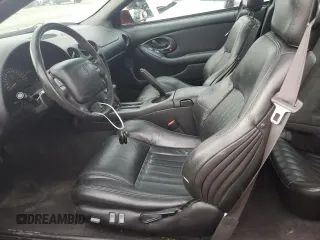 2002 Pontiac Firebird Formula z VIN 2G2FV22G822142457, wystawiony jako Copart lot #68560164 z przebiegiem 134 506 mil mil oraz Szkoda całkowita • Salvage title. Historia ofert i sprzedaży dostępna na DreamBid. Obrazek 7.