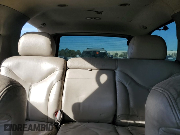 2000 GMC Yukon SLE with VIN 1GKEK13T2YJ130870, listed as a Copart auction lot 82887054 with 310,765 mi miles and Salvage Title. Bid and sale history available at carsss.com. Image 10.