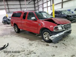 2000 Ford F-150 XL with VIN 1FTRX17W3YNC12019, listed as a Copart auction lot 41402325 with 182,123 mi miles and Salvage Title. Bid and sale history available at carsss.com. Image 4.