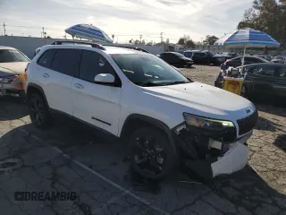 2021 Jeep Cherokee Altitude with VIN 1C4PJLLB1MD112671, listed as a Copart auction lot 44832295 with 72,356 mi miles and Salvage Title. Bid and sale history available at carsss.com. Image 4.