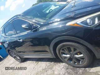2017 Hyundai Santa Fe Ultimate z VIN 5NMZW4LA1HH052430, wystawiony jako IAAI lot #42205489 z przebiegiem 85 720 mil mil oraz . Historia ofert i sprzedaży dostępna na DreamBid. Obrazek 13.