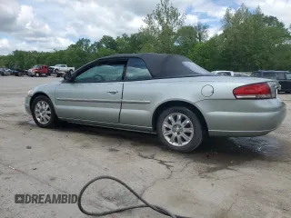 2004 Chrysler Sebring Limited z VIN 1C3EL65R74N181053, wystawiony jako Copart lot #57616835 z przebiegiem 90 898 mil mil oraz Szkoda całkowita • Salvage title. Historia ofert i sprzedaży dostępna na DreamBid. Obrazek 2.