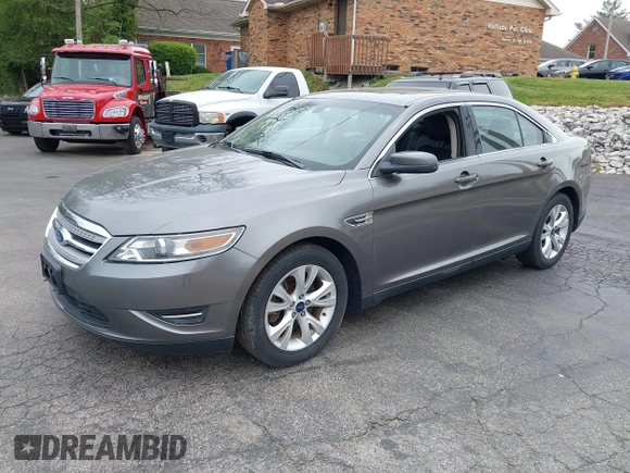 2012 Ford Taurus SEL with VIN 1FAHP2EW4CG107920, listed as a IAAI auction lot 42044023 with 107,696 mi miles and . Bid and sale history available at DreamBid. Image 2.