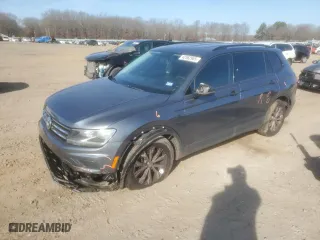 2018 Volkswagen Tiguan S with VIN 3VV1B7AX3JM009567, listed as a Copart auction lot 42562965 with 134,016 mi miles and Salvage Title. Bid and sale history available at carsss.com. Image 1.