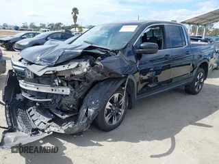 2020 Honda Ridgeline RTL with VIN 5FPYK3F53LB030107, listed as a IAAI auction lot 41933517 with 93,373 mi miles and . Bid and sale history available at DreamBid. Image 17.