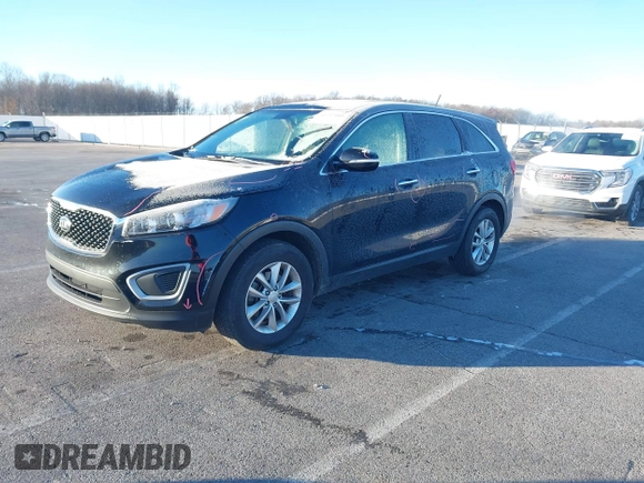 2018 Kia Sorento LX with VIN 5XYPG4A34JG431818, listed as a IAAI auction lot 40997995 with 141,886 mi miles. Bid and sale history available at carsss.com. Image 2.