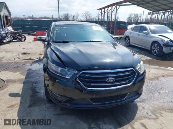 2014 Ford Taurus Limited with VIN 1FAHP2F80EG104984, listed as a IAAI auction lot 41910463 with 174,034 mi miles. Bid and sale history available at carsss.com. Image 12.