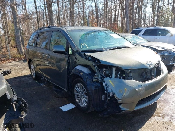 2012 Toyota Sienna XLE AAS with VIN 5TDYK3DC8CS254057, listed as a IAAI auction lot 41853010 with 84,351 mi miles. Bid and sale history available at carsss.com. Image 6.
