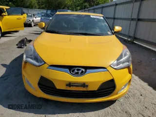 2016 Hyundai Veloster z VIN KMHTC6ADXGU265581, wystawiony jako Copart lot #57428485 z przebiegiem 125 612 mil mil oraz Tytuł czysty. Historia ofert i sprzedaży dostępna na DreamBid. Obrazek 5.