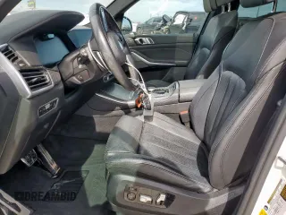 2021 BMW X5 xDrive40i with VIN 5UXCR6C04M9D99175, listed as a Copart auction lot 57660895 with 60,763 mi miles and Clean title. Bid and sale history available at DreamBid. Image 7.