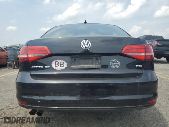 2015 Volkswagen Jetta SE with VIN 3VWD17AJ1FM349301, listed as a Copart auction lot 58963255 with 156,480 mi miles and Salvage title. Bid and sale history available at DreamBid. Image 6.