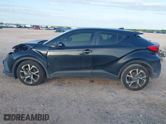 2018 Toyota C-HR XLE with VIN JTNKHMBX6J1007058, listed as a IAAI auction lot 42100587 with 71,725 mi miles and . Bid and sale history available at DreamBid. Image 15.