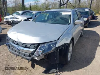 2012 Ford Fusion SE with VIN 3FAHP0HA9CR210330, listed as a IAAI auction lot 41988499 with 165,395 mi miles and . Bid and sale history available at DreamBid. Image 2.