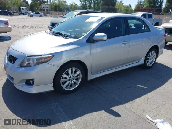 2009 Toyota Corolla with VIN 1NXBU40E69Z045543, listed as a IAAI auction lot 42201200 with 143,533 mi miles. Bid and sale history available at carsss.com. Image 2.