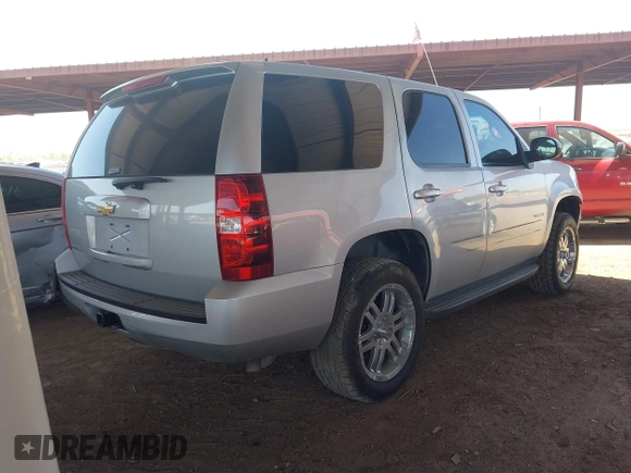 2013 Chevrolet Tahoe LS with VIN 1GNSCAE03DR179027, listed as a IAAI auction lot 42096434 with 205,143 mi miles and . Bid and sale history available at DreamBid. Image 4.