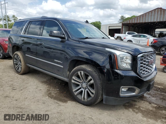 2019 GMC Yukon Denali with VIN 1GKS1CKJ0KR259491, listed as a Copart auction lot 51071335 with 105,294 mi miles and Salvage Title. Bid and sale history available at carsss.com. Image 4.