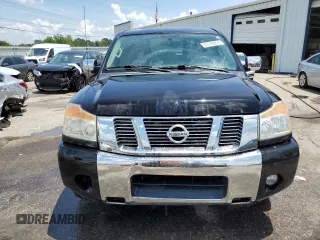 2012 Nissan Titan SV with VIN 1N6BA0ED1CN323589, listed as a Copart auction lot 62068904 with 148,354 mi miles and Salvage Title. Bid and sale history available at DreamBid. Image 5.