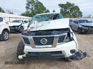 2017 Nissan Frontier SV with VIN 1N6DD0EV2HN765247, listed as a IAAI auction lot 41017764 with 141,942 mi miles and . Bid and sale history available at DreamBid. Image 13.
