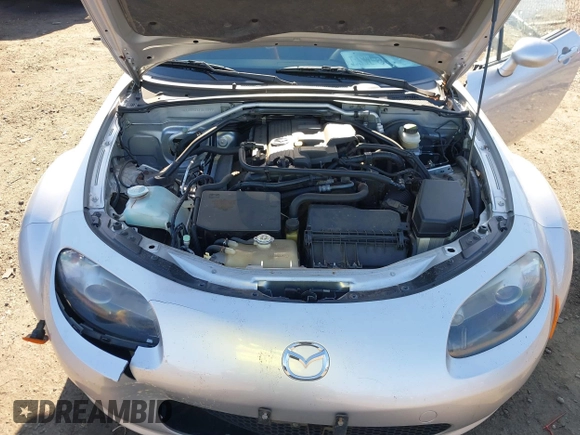 2007 Mazda MX-5 Miata Sport z VIN JM1NC25F170135777, wystawiony jako IAAI lot #41746586 z przebiegiem 107 302 mil mil oraz . Historia ofert i sprzedaży dostępna na DreamBid. Obrazek 10.