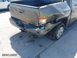 2007 Honda Ridgeline RTL w/Leather with VIN 2HJYK16527H547522, listed as a IAAI auction lot 41939603 with 127,899 mi miles. Bid and sale history available at carsss.com. Image 6.