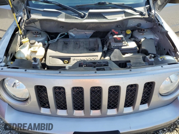 2015 Jeep Patriot Latitude with VIN 1C4NJPFB1FD157025, listed as a Copart auction lot 52310155 with 132,752 mi miles and Salvage title. Bid and sale history available at DreamBid. Image 12.