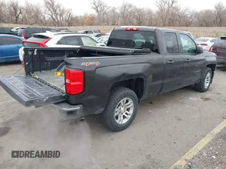 2014 Chevrolet Silverado 1500 LT with VIN 1GCVKREC8EZ325070, listed as a IAAI auction lot 41328199 with 164,009 mi miles and . Bid and sale history available at DreamBid. Image 4.