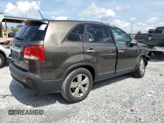 2012 Kia Sorento EX with VIN 5XYKU3A67CG273792, listed as a Copart auction lot 63869745 with Not provided miles and Salvage title. Bid and sale history available at DreamBid. Image 3.