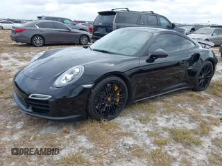 2014 Porsche 911 Turbo S with VIN WP0AD2A99ES167048, listed as a IAAI auction lot 40643041 with Not Provided miles. Bid and sale history available at carsss.com. Image 2.