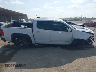 2019 Chevrolet Colorado 4WD ZR2 z VIN 1GCGTEEN7K1202435, wystawiony jako IAAI lot #42058476 z przebiegiem 150 717 mil mil oraz . Historia ofert i sprzedaży dostępna na DreamBid. Obrazek 13.