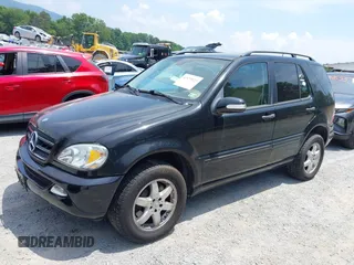 2004 Mercedes-Benz M 500 with VIN 4JGAB75E54A512828, listed as a IAAI auction lot 42579923 with 262,406 mi miles and . Bid and sale history available at DreamBid. Image 6.