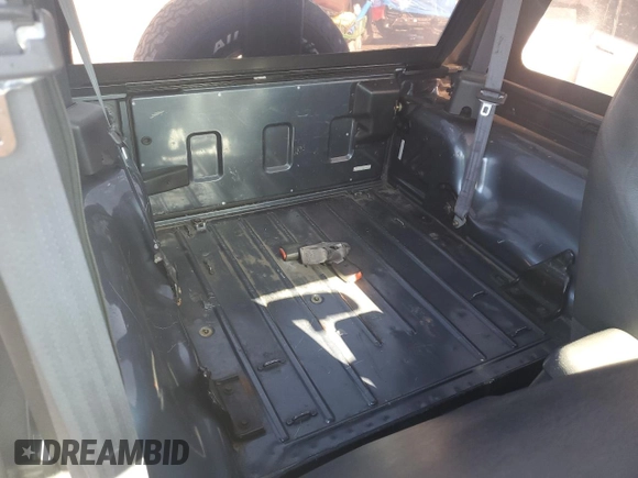 2002 Jeep Wrangler Sport with VIN 1J4FA49S22P703610, listed as a Copart auction lot 50900605 with 70,045 mi miles and Salvage Title. Bid and sale history available at carsss.com. Image 11.