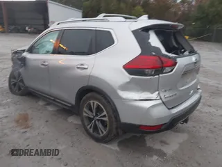 2017 Nissan Rogue SV with VIN JN8AT2MT7HW143178, listed as a IAAI auction lot 41015343 with 139,828 mi miles and . Bid and sale history available at DreamBid. Image 3.