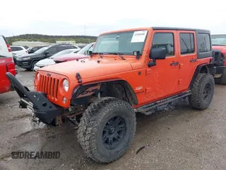 2015 Jeep Wrangler Unlimited Sahara with VIN 1C4BJWEG6FL603265, listed as a IAAI auction lot 41956606 with 70,983 mi miles. Bid and sale history available at carsss.com. Image 17.