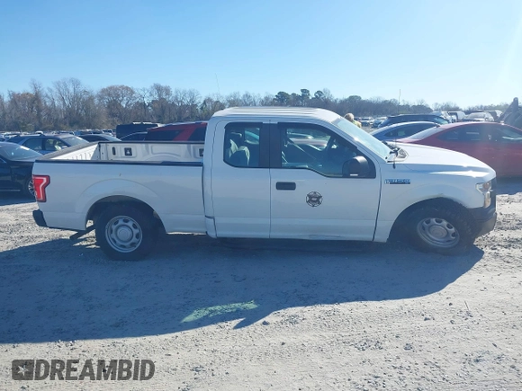 2015 Ford F-150 XL with VIN 1FTEX1C86FFB98582, listed as a IAAI auction lot 41678059 with 76,424 mi miles. Bid and sale history available at carsss.com. Image 13.