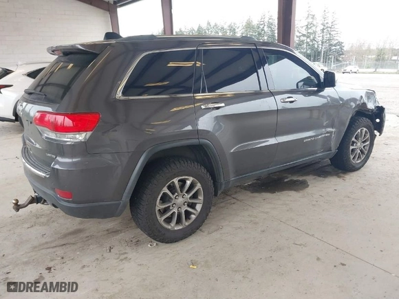 2015 Jeep Grand Cherokee Limited with VIN 1C4RJFBG4FC852117, listed as a IAAI auction lot 41905996 with 137,337 mi miles. Bid and sale history available at carsss.com. Image 4.