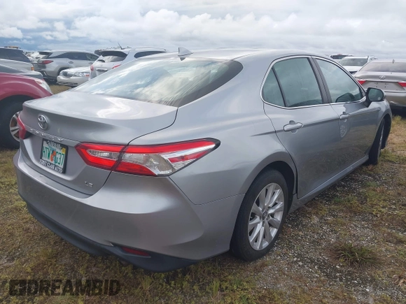 2020 Toyota Camry LE with VIN 4T1C11AK8LU939793, listed as a IAAI auction lot 40523304 with Not Provided miles and . Bid and sale history available at DreamBid. Image 4.