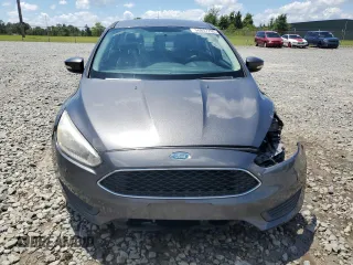 2016 Ford Focus SE with VIN 1FADP3F29GL233719, listed as a Copart auction lot 56857705 with 140,785 mi miles and Salvage title. Bid and sale history available at DreamBid. Image 5.