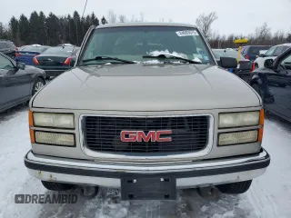 1999 GMC Suburban with VIN 3GKGK26J7XG537043, listed as a Copart auction lot 44683575 with 196,124 mi miles and Salvage Title. Bid and sale history available at carsss.com. Image 5.