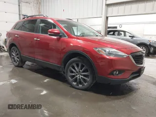 2015 Mazda CX-9 Grand Touring z VIN JM3TB3DAXF0464215, wystawiony jako IAAI lot #42043092 z przebiegiem 119 269 mil mil oraz . Historia ofert i sprzedaży dostępna na DreamBid. Obrazek 1.