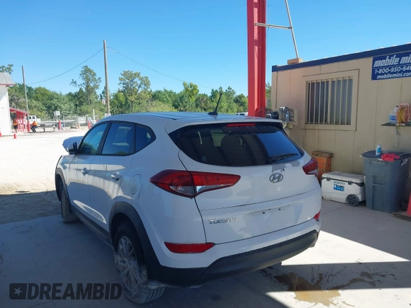 2017 Hyundai Tucson SE with VIN KM8J23A45HU328404, listed as a IAAI auction lot 41695180 with 120,458 mi miles. Bid and sale history available at carsss.com. Image 3.