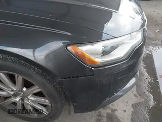 2014 Audi A6 Premium Plus z VIN WAUGFAFC7EN025053, wystawiony jako IAAI lot #42131033 z przebiegiem 154 552 mil mil oraz . Historia ofert i sprzedaży dostępna na DreamBid. Obrazek 17.